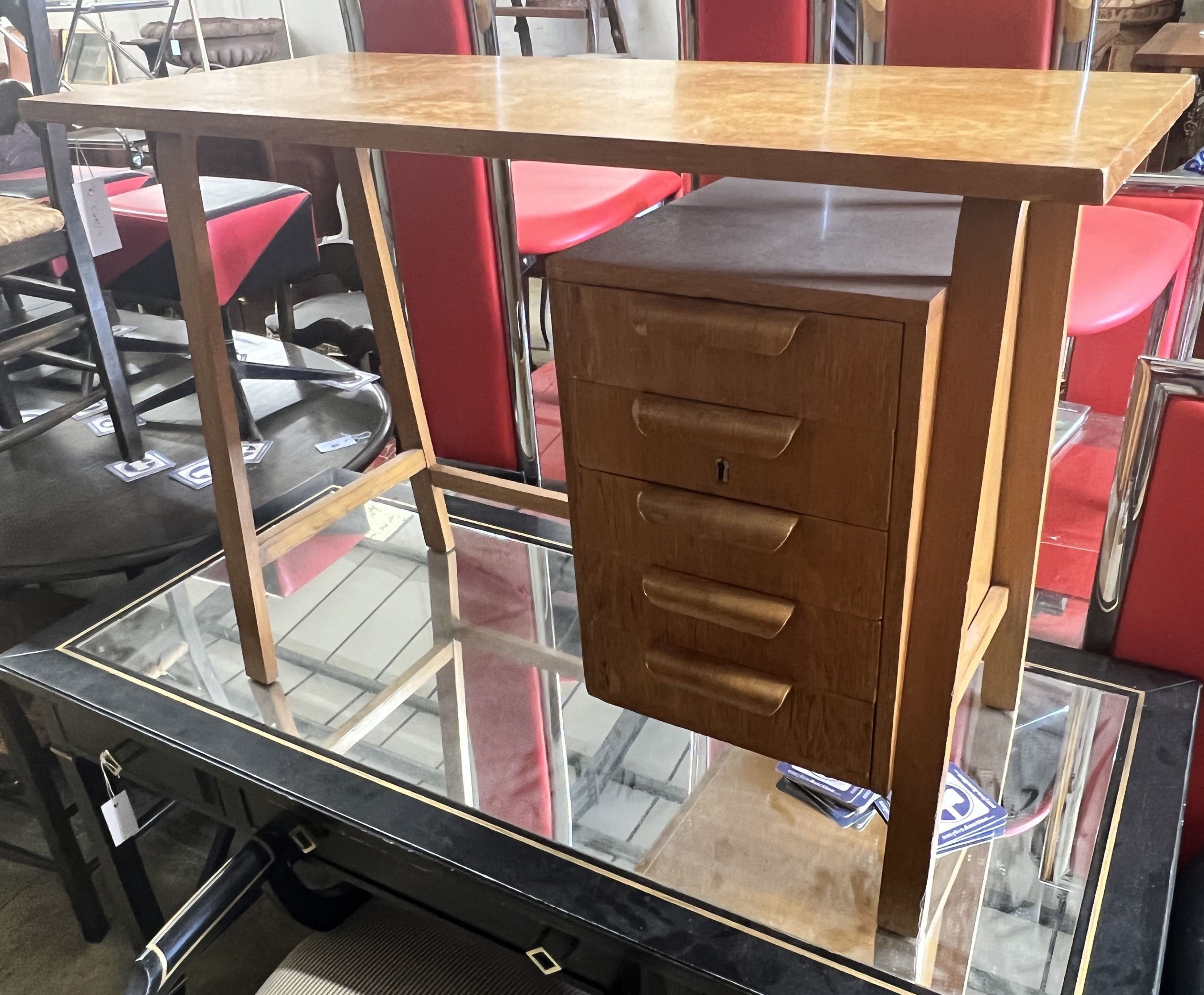 A Gordon Russell teak desk, width 99cm, depth 44cm height 69cm